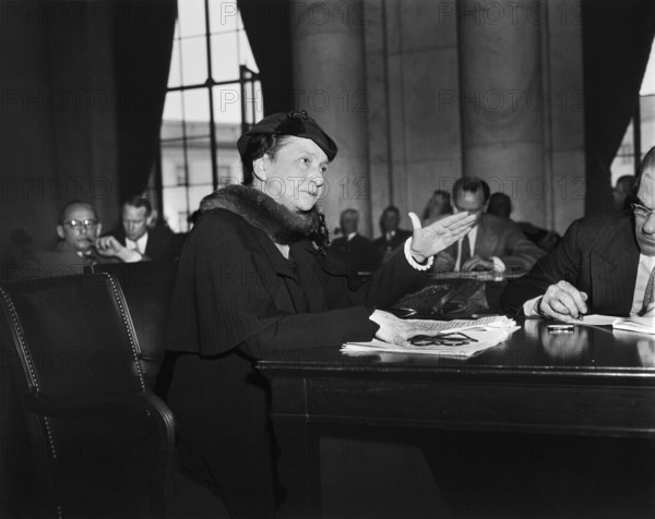 Frances, Perkins, U.S. Secretary of Labor, attending committee meeting, Washington, D.C., USA, Harris & Ewing, 1936