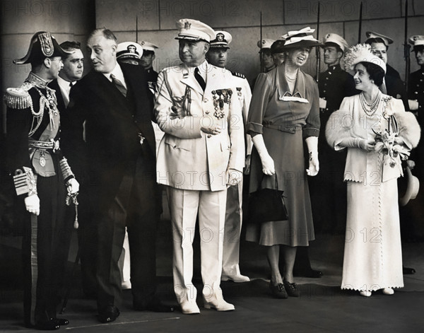 U.S. President  Franklin D. Roosevelt in conversation with King George VI while U.S. First Lady Eleanor Roosevelt and Queen Elizabeth exchange pleasantries at Union Station, Washington, D.C., USA, Franklin D. Roosevelt Presidential Library & Museum, June 8, 1939