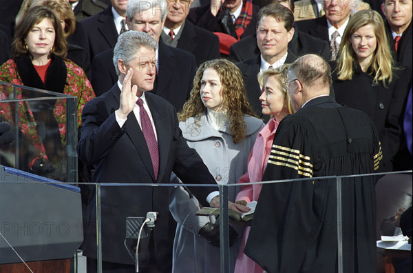 U.S. President Bill Clinton taking oath of office from Chief Justice William H. Rehnquist and is sworn in as U.S. President, Washington, D.C., USA, Barbara Kinney, White House Photograph Office, January 20, 1997