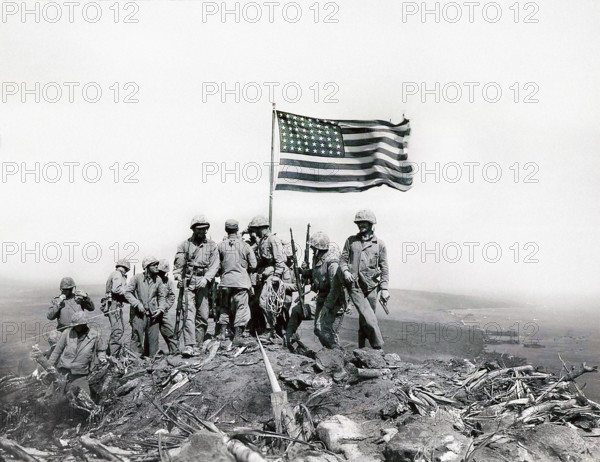 U.S. Marines of Fifth Marine Division raise American flag on Mount Suribachi, Iwo Jima, Bob Campbell, U.S. Marine Corps, February 23, 1945