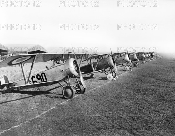 Twenty-six airplanes in line for inspection, aviation field, Issoudun, France, U.S. Army Signal Corps, April 1918