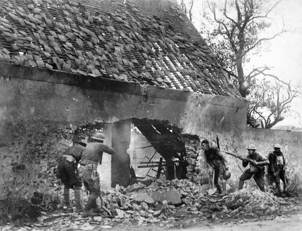 American snipers of the 166th Infantry (formerly 4th Infantry, Ohio National Guard), in nest picking off Germans on the outer edge of town, Villers-sur-Fere, France, U.S. Army Signal Corps, July 30, 1918