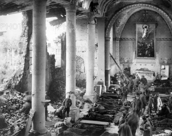 Temporary shelter in church ruins for American wounded being treated by 110th Sanitary Train, 4th Ambulance Corps, Neuvilly, France, U.S. Army Signal Corps, September 20, 1918