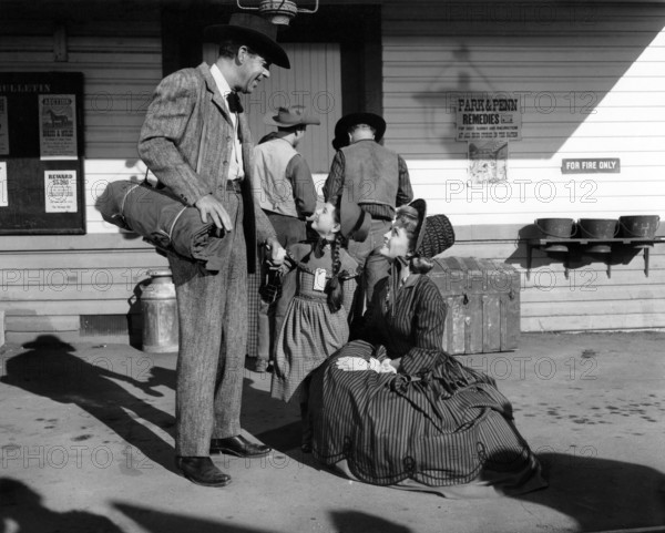 Fred MacMurray, Gina Gillespie, Dorothy Green, on-set of the western film, "Face Of A Fugitive", Columbia Pictures, 1959