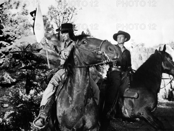 Macdonald Carey, Wendell Corey, on-set of the western film, "The Great Missouri Raid", Paramount Pictures, 1951