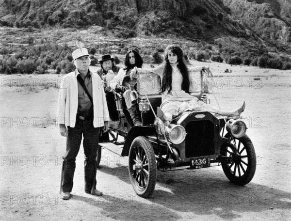 Lee Marvin, Strother Martin, Oliver Reed, Elizabeth Ashley, on-set of the western film, "The Great Scout And Cathouse Thursday", United Artists, 1976