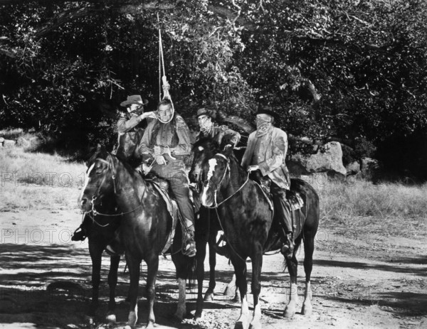 Boyd "Red" Morgan (being lynched), on-set of the western film, "Gunfighters of Abilene", United Artists, 1959