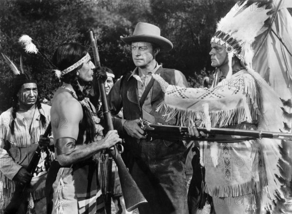 Richard Denning (center), Robert Bice (right), on-set of the western film, "The Gun That Won The West", Columbia Pictures, 1955