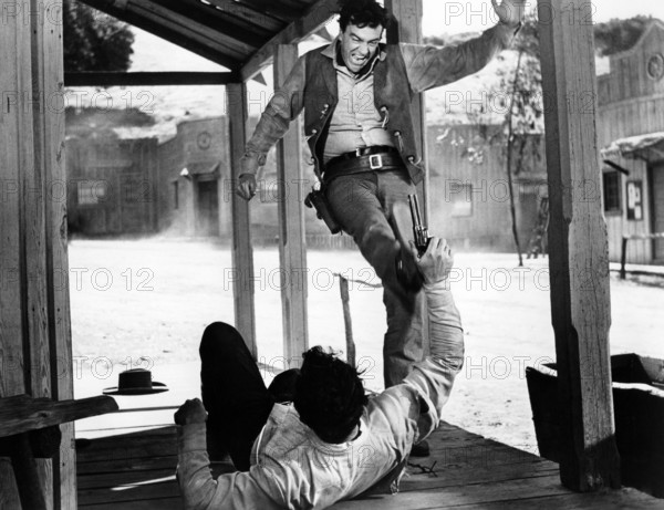 Don Megowan (laying on ground), James Arness, on-set of the western film, "Gun The Man Down", United Artists, 1956