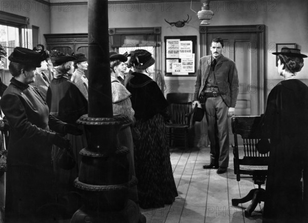 Gregory Peck, on-set of the western film, "The Gunfighter", 20th Century-Fox, 1950