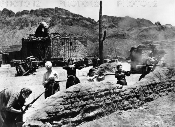 Hope Emerson (left), Peggy Maley (second left), on-set of the western film, "The Guns Of Fort Petticoat", Columbia Pictures, 1957