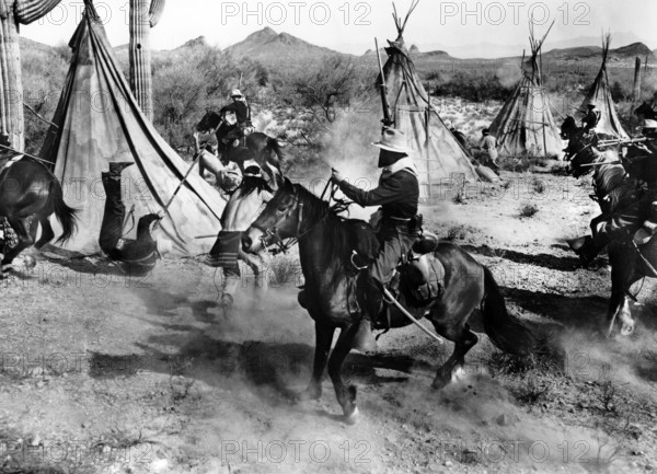 U.S. Cavalry attacking Apache village, on-set of the western film, "The Guns Of Fort Petticoat", Columbia Pictures, 1957