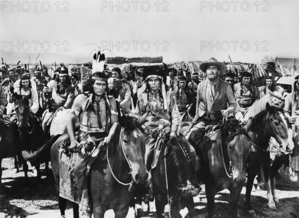 Ray Teal (on horse, right), on-set of the western film, "The Guns Of Fort Petticoat", Columbia Pictures, 1957