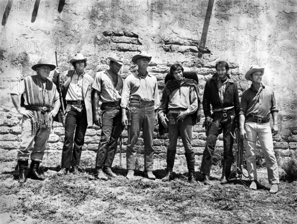 James Whitmore, Joe Don Baker, Bernie Casey, George Kennedy, Reni Santoni, Scott Thomas, Monte Markham, on-set of the western film, "Guns Of The Magnificent Seven", United Artists, 1969