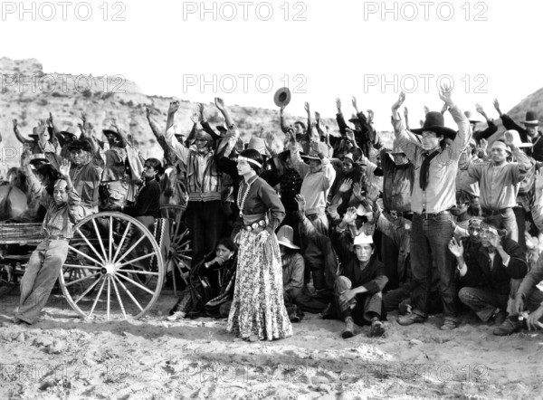 Dorothy Appleby (standing center), on-set of the western film, "King Of The Wild Horses", Columbia Pictures, 1933