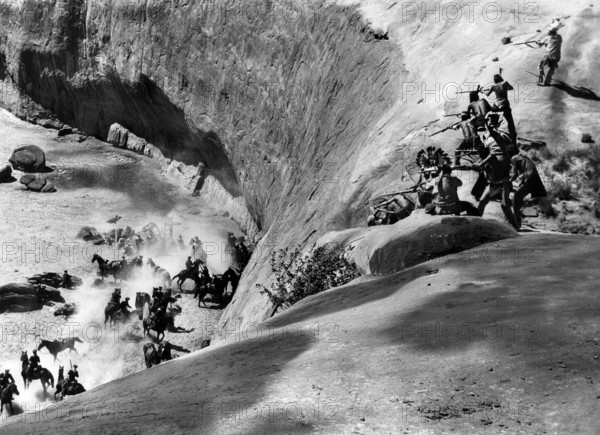 Shoshone fighters attacking U.S. Cavalry, on-set of the western film, "Kit Carson", United Artists, 1940