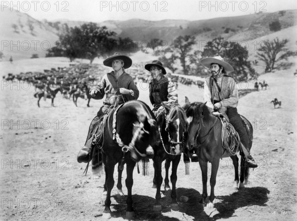 Richard Barthelmess (left), on-set of the western film, "The Lash", First National Pictures, Warner Bros., 1930