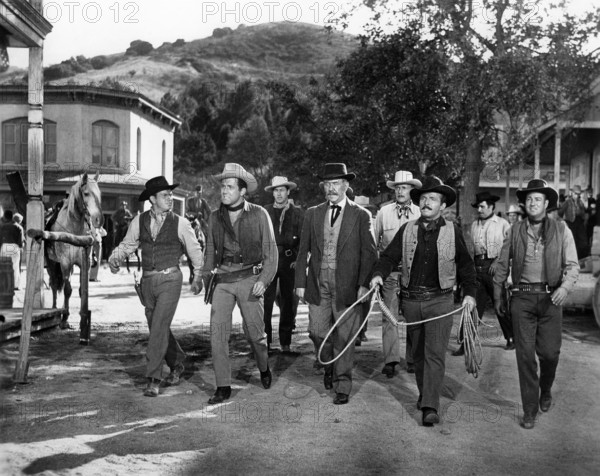 Lynching mob walking to the jail to demand the release of the Durango Kid, on-set of the western film, "Law And Order", Universal Pictures, 1953