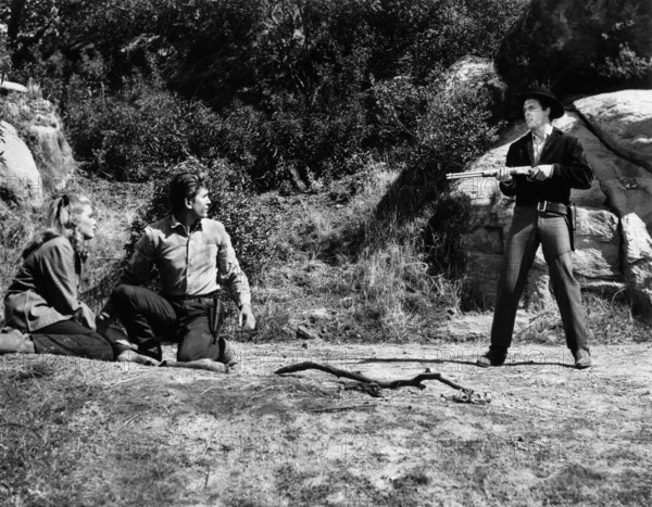 Jo Morrow, Michael Landon, Jack Hogan, on-set of the western film, "The Legend Of Tom Dooley", Columbia Pictures, 1959