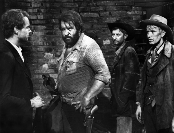 Terence Hill (left,) Bud Spencer (2nd left), Ezio Marano (2nd right), on-set of the Italian spaghetti western film, "They Call Me Trinity", Italian: "Lo chiamavano Trinità", Delta, 1970, AVCO Embassy Pictures, 1971