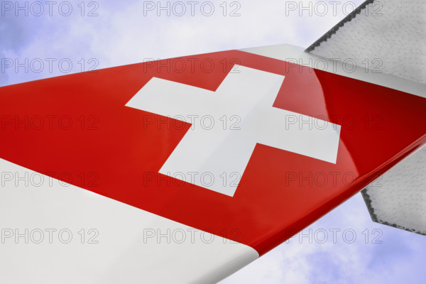 Swiss Airlines logo on airplane tail fin