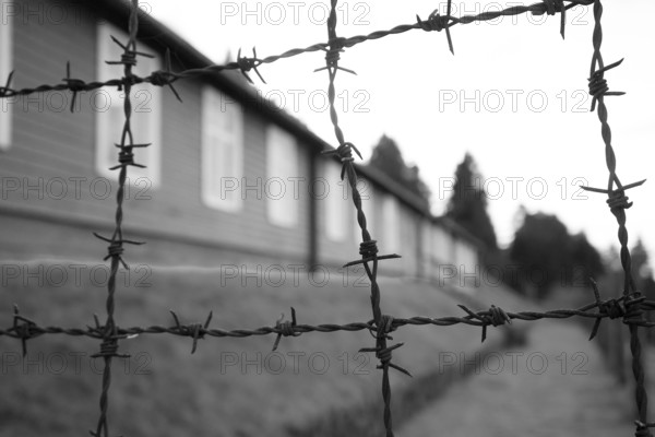 Barbed wire and building exterior, Natzweiler-Struthof Nazi concentration camp, Natzwiller, Bas-Rhin, France