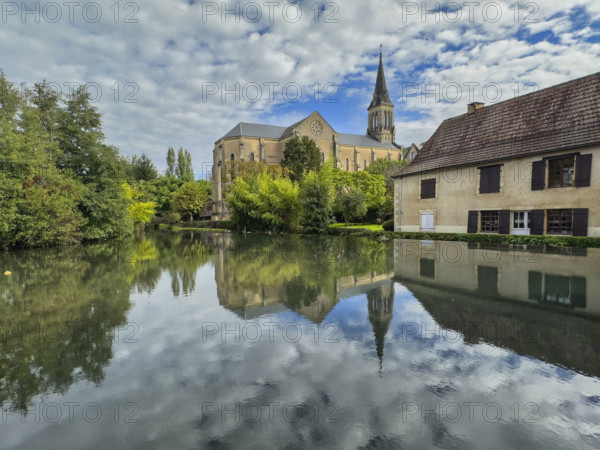 Reflections on scenic river, Le Bugue, France