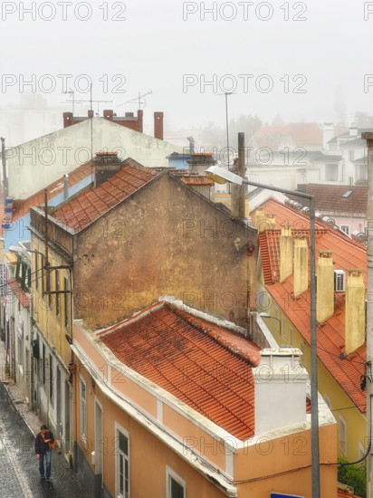 High angle view of quaint residential buildings with terra cotta tile roofs, Monte Estoril, Cascais e Estoril, Portugal