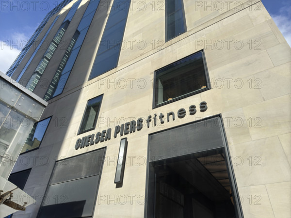 Chelsea Piers Fitness, low angle view of building exterior and company sign, New York City, New York, USA