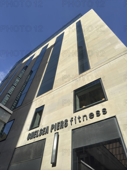 Chelsea Piers Fitness, low angle view of building exterior and company sign, New York City, New York, USA