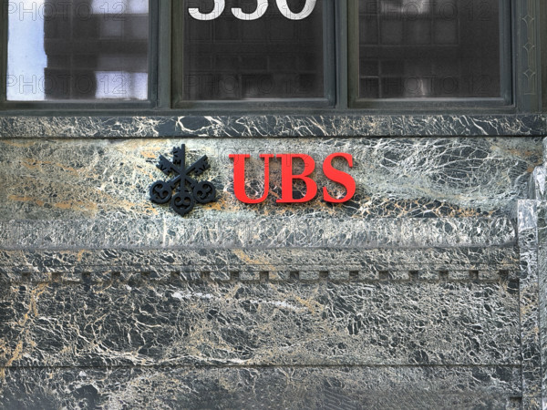 UBS Group AB, office building exterior with company logo and sign, New York City, New York, USA