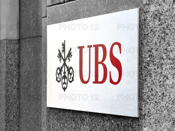 UBS Group AB, close-up of office building exterior with company logo and sign, New York City, New York, USA