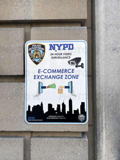 NYPD Station E-Commerce Exchange Zone, close-up of sign on building exterior, 10th Precinct, New York City, New York, USA