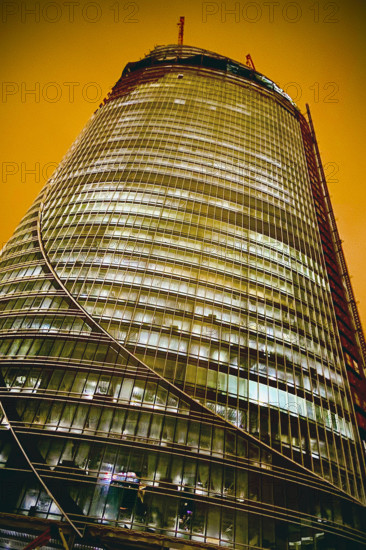 Low angle view of One Congress skyscraper under construction at night, Bulfinch Crossing, Boston, Massachusetts, USA