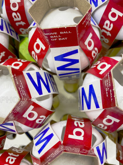 High angle view of packaged wiffle balls and bats in store