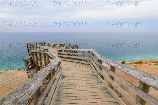 Sunrise over Lake Michigan from wood foot path