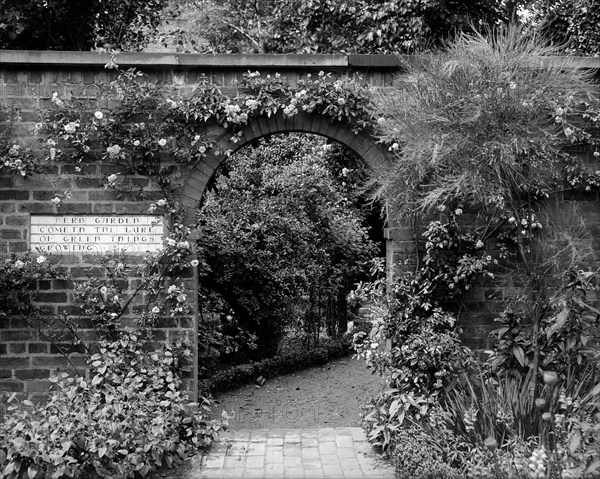 Entrance to the herb garden in Wardrobe Court, Hampton Court Palace, Richmond, London