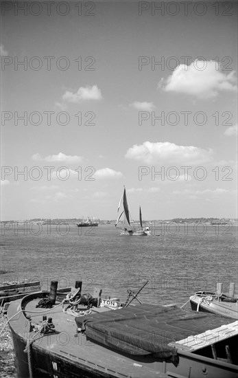 Barges on the Thames at Tilbury, Essex, c1945-c1965