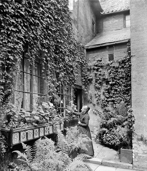 A lady gardener, c1860-c1922