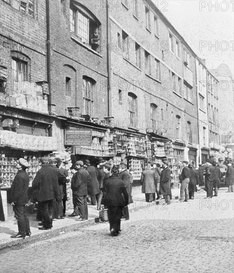 Sunday bird fair, Sclater Street, off Brick Lane, London, c1900. Artist: John Galt