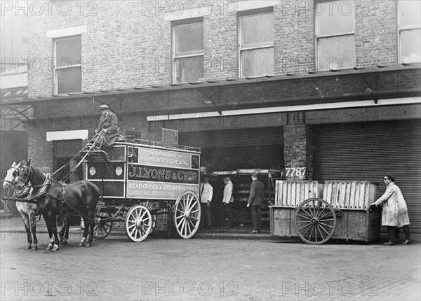 A horse drawn Lyons van, Cadby Hall, West Kensington, London. Artist: Unknown