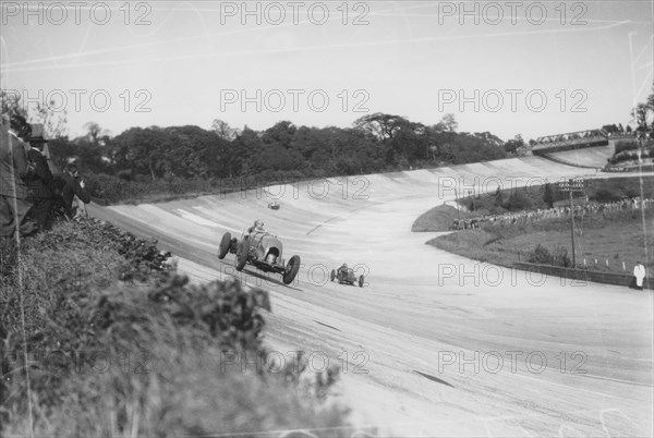 Henry Birkin in a Bentley, Brooklands, Surrey, (c1932?). Artist: Unknown