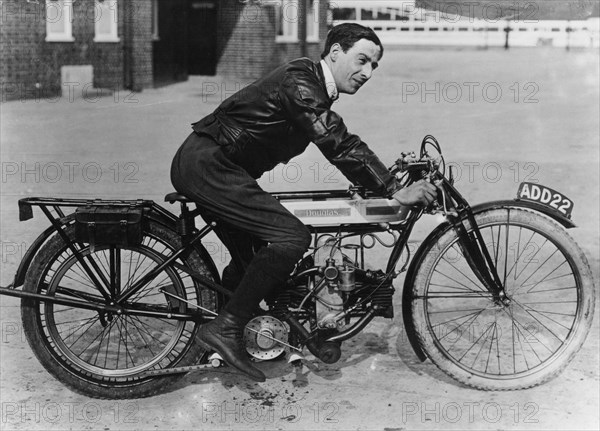 F Ball riding a 1913 Douglas motorbike, (c1913?). Artist: Unknown