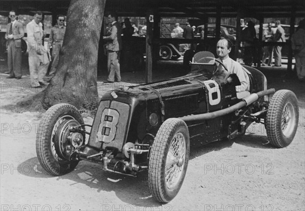 Raymond Mays in his 1.5 litre ERA, Donington,1937. Artist: Unknown