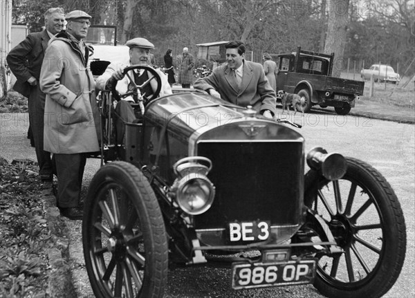 Lord Brabazon in the driver's seat of a vintage car, 1956. Artist: Unknown