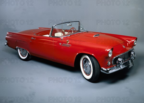 A 1955 Ford Thunderbird. Artist: Unknown