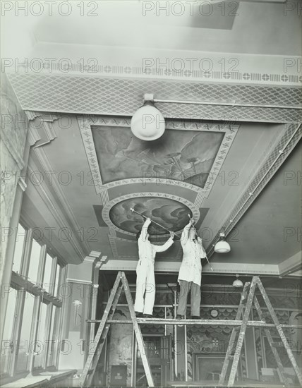 Students painting a design on the ceiling, School of Building, Brixton, London, 1939. Artist: Unknown.