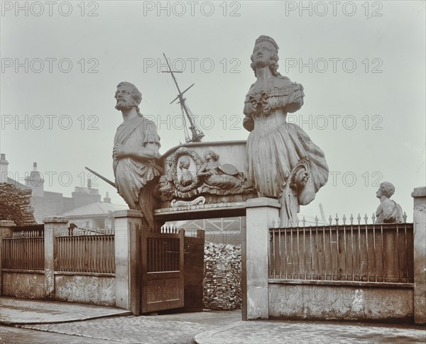 Huge figureheads at Castle's Ship Breaking Yard, Westminster, London, 1909. Artist: Unknown.