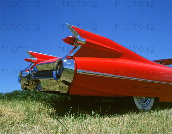 1959 Cadillac series 62 tail fins. Artist: Unknown.