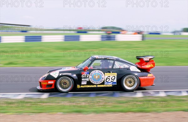 1999 Porsche 911 GT2 FIA GT Silverstone 500. Artist: Unknown.